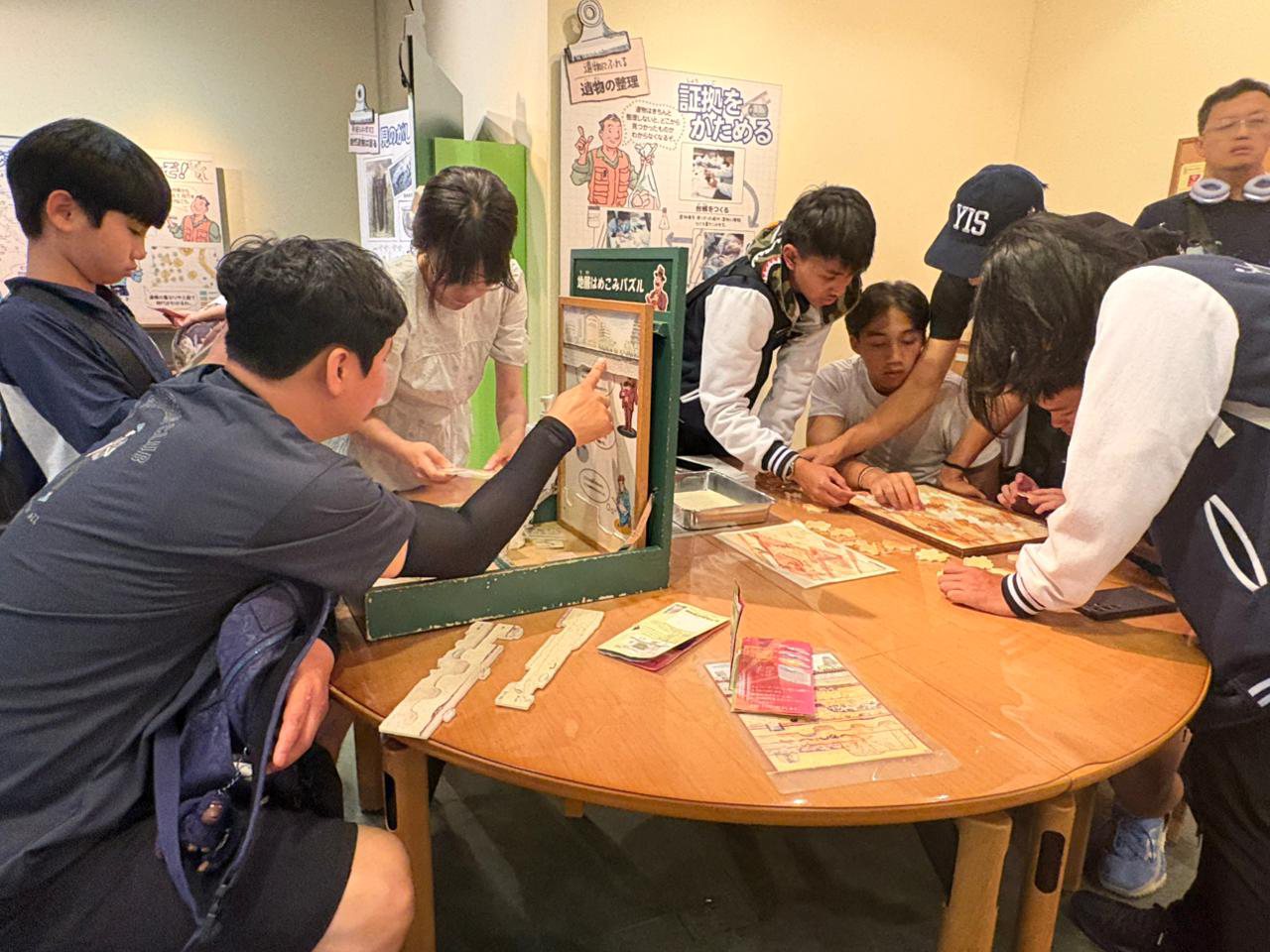 YIS students working with hands-on exhibits at Osaka Museum of History
